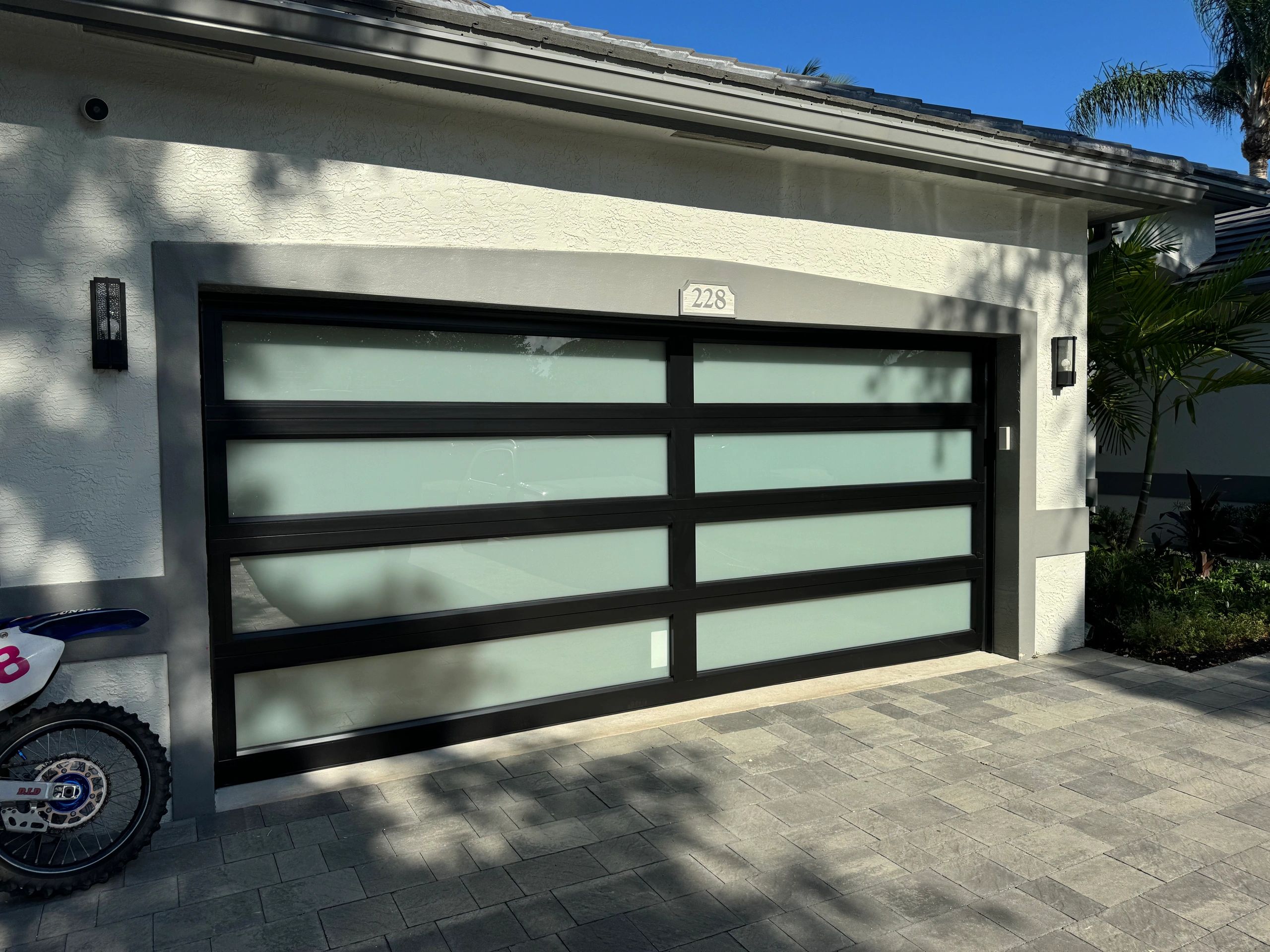 Modern black aluminum garage door